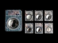 A Group of Seven 2019 NGC, PCGS and ANACS Graded MS70/PF70 Apollo 11 Commemorative Coins