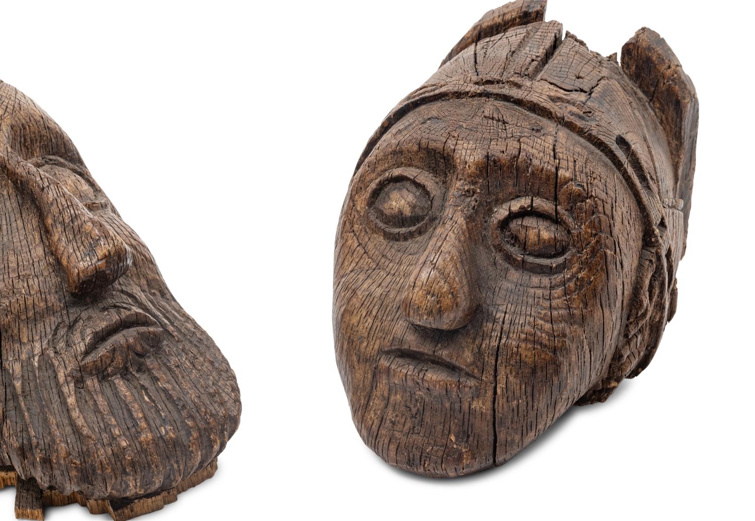 A Pair of Scottish Gothic Carved Oak Heads
