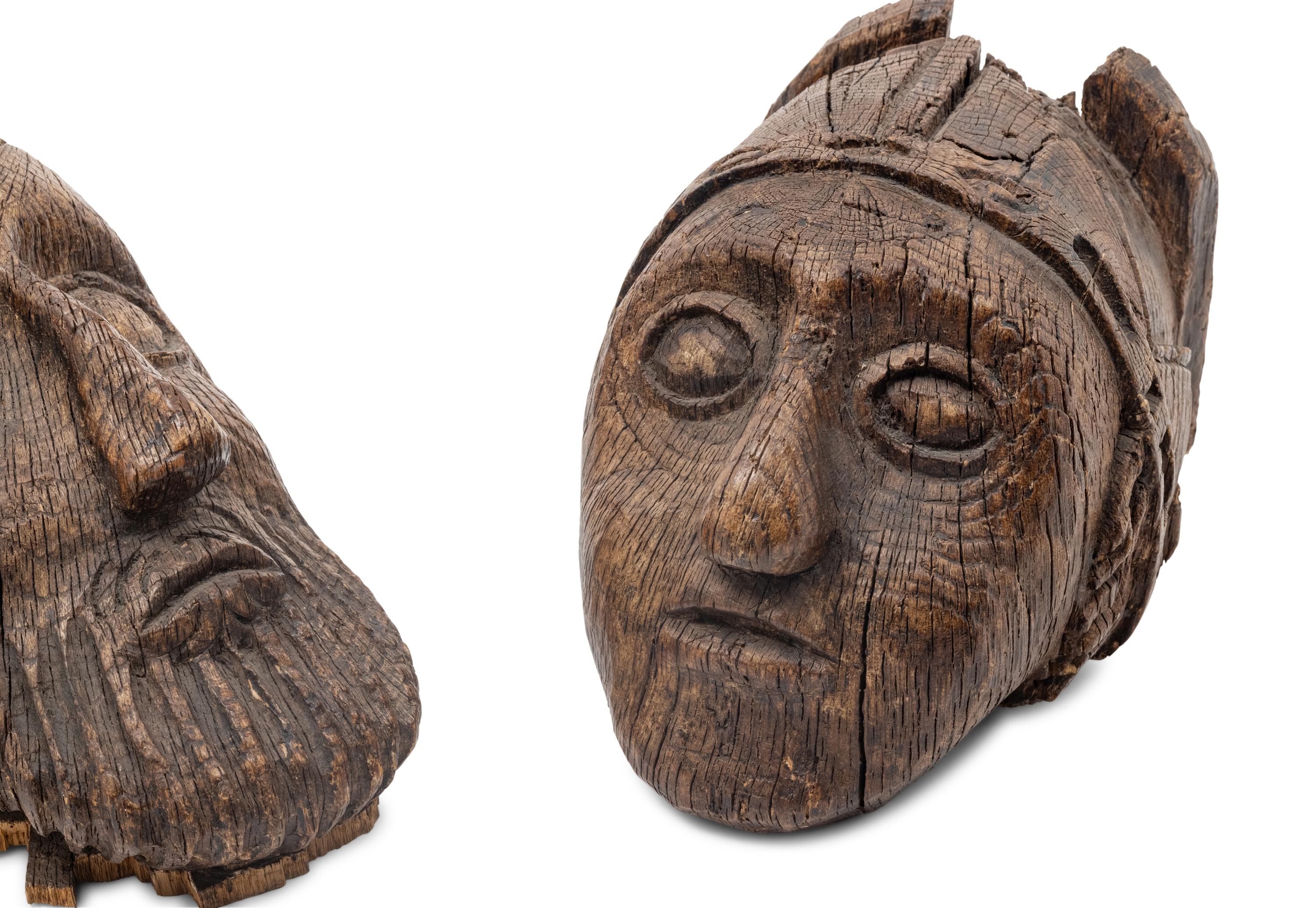 A Pair of Scottish Gothic Carved Oak Heads