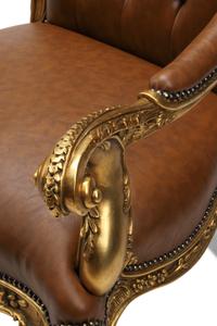 A Pair of Régence Style Giltwood Fauteuils
