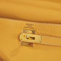 An Hermès Kelly Retourne 35 in Sable Calf Leather Hermès