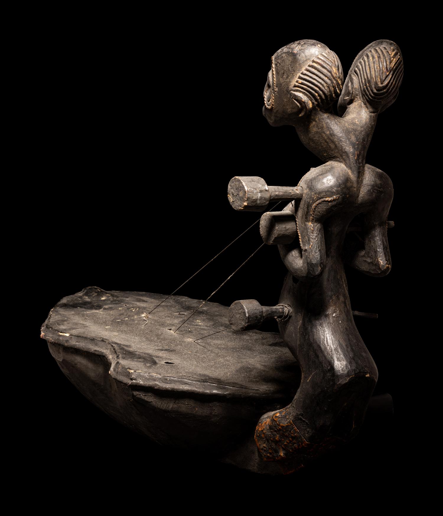 An African Harp with Figural Neck