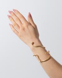 VERDURA, PAIR OF YELLOW GOLD AND RUBY 'MEDUSA' SERPENT CUFF BRACELETS