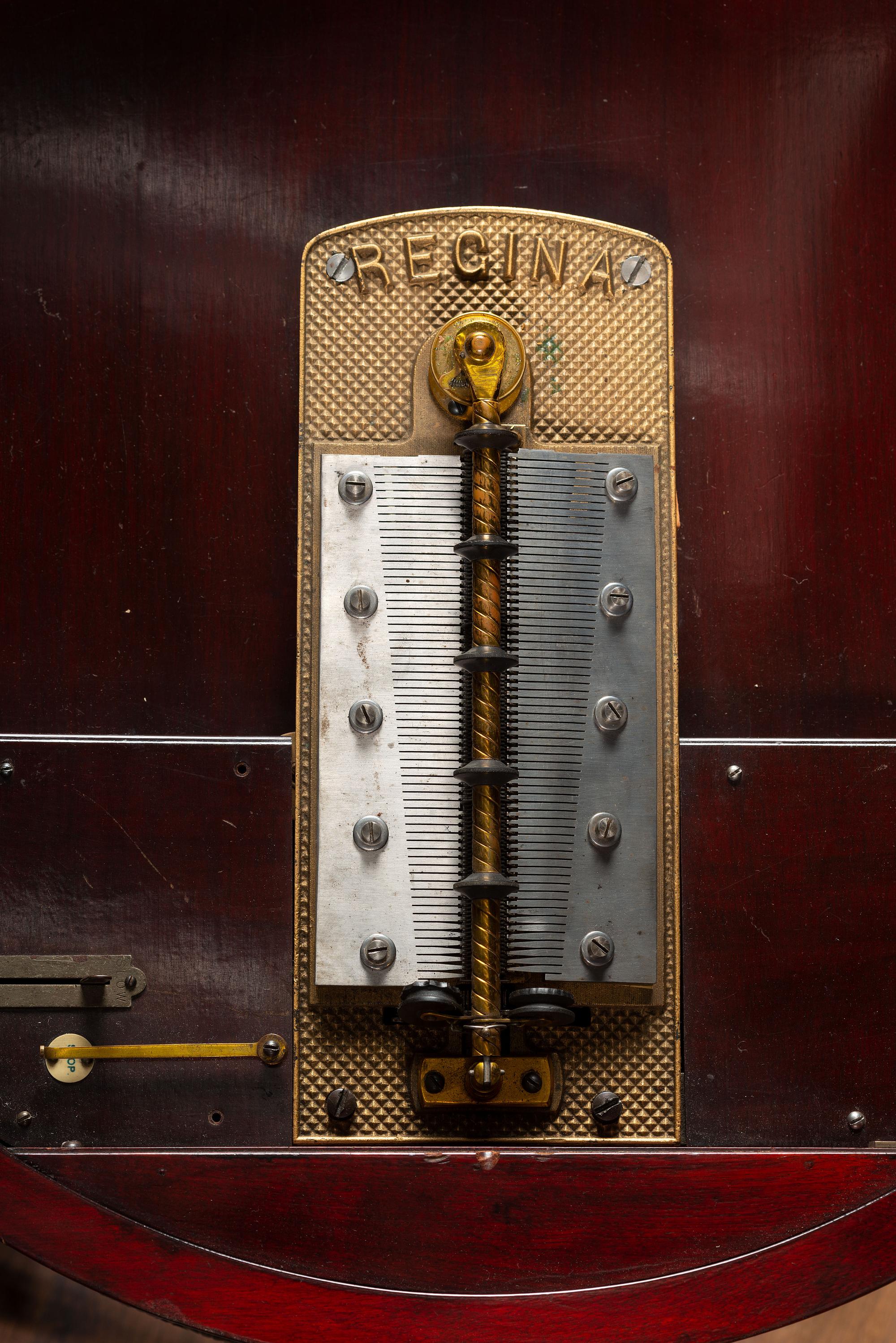 A Regina 'Rookwood ' Paint Decorated 20 Inch Drum Music Box