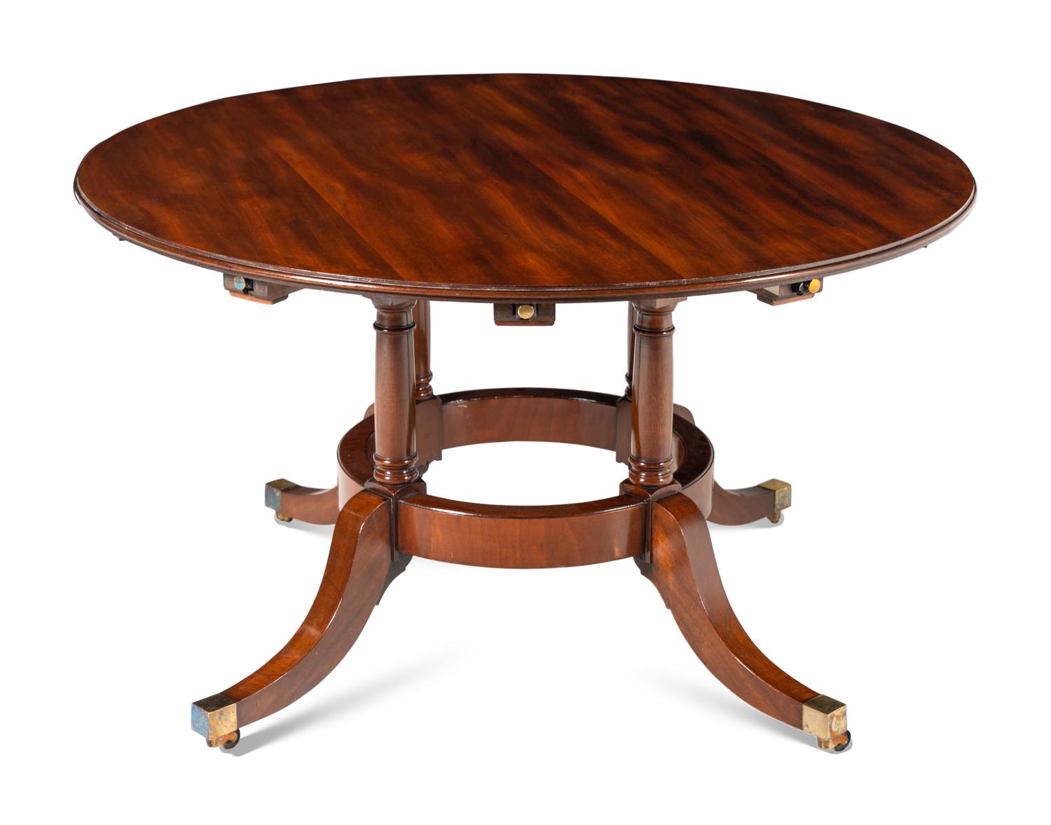 A George III Style Circular Extension Dining Table