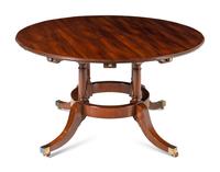 A George III Style Circular Extension Dining Table