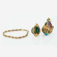 A 14K Yellow Gold Bracelet and Two Vintage Yellow Gold Charms