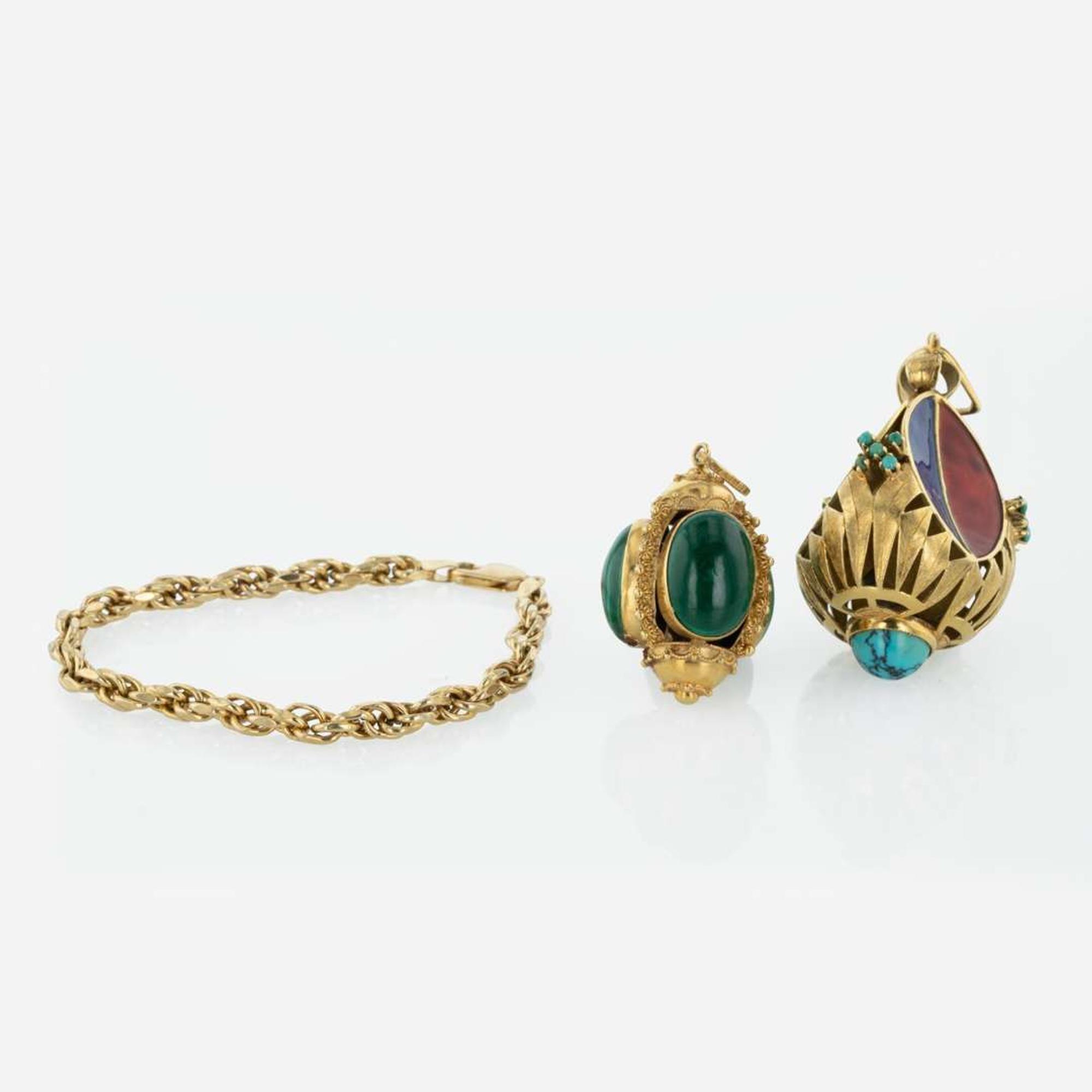 A 14K Yellow Gold Bracelet and Two Vintage Yellow Gold Charms