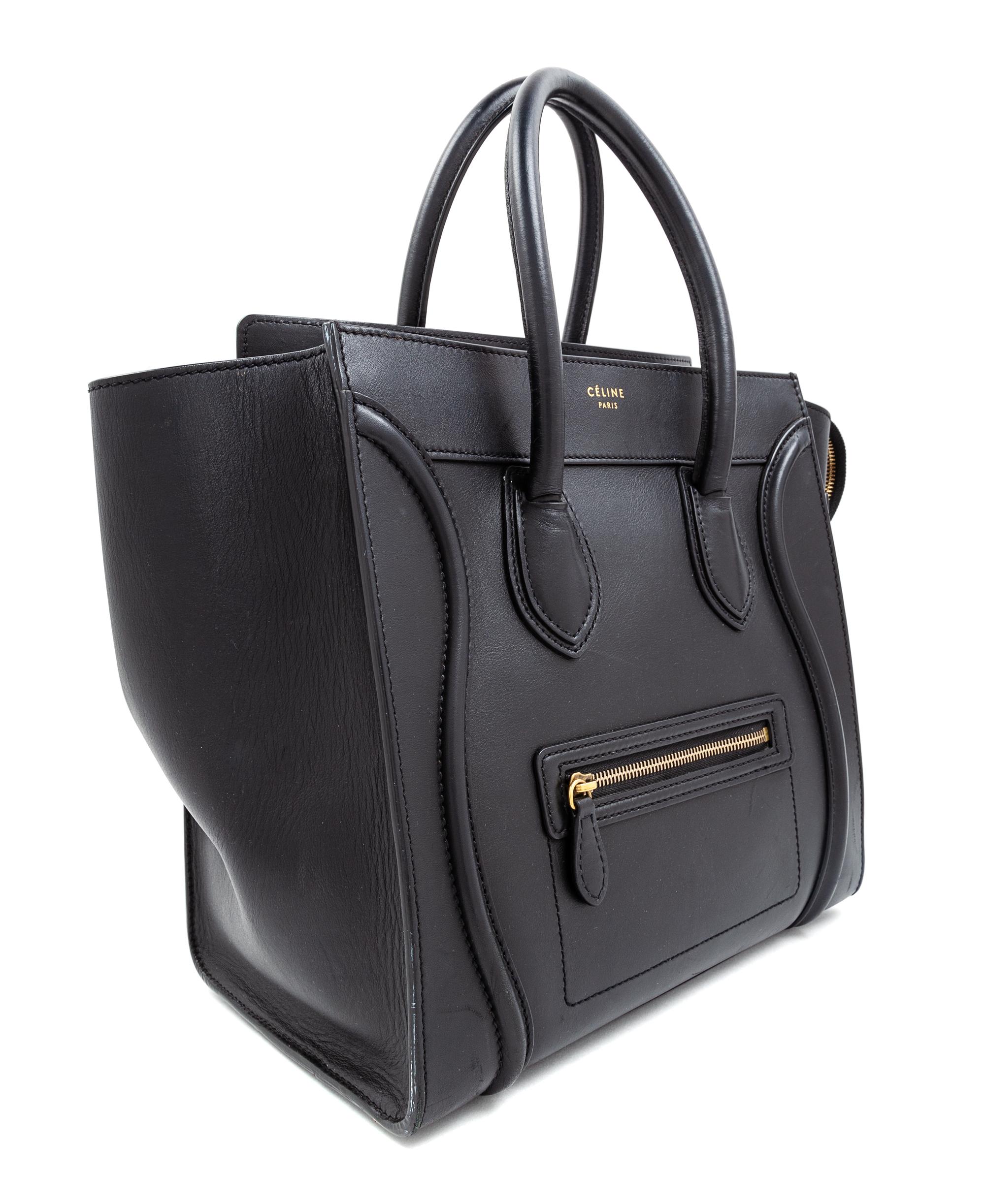 A Celine Black Smooth Leather Luggage Tote Bag, 12" H x 12" W x 7" D; Handle drop: 6".