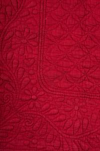A Trapunto 'Heart' Pattern Cotton Quilt