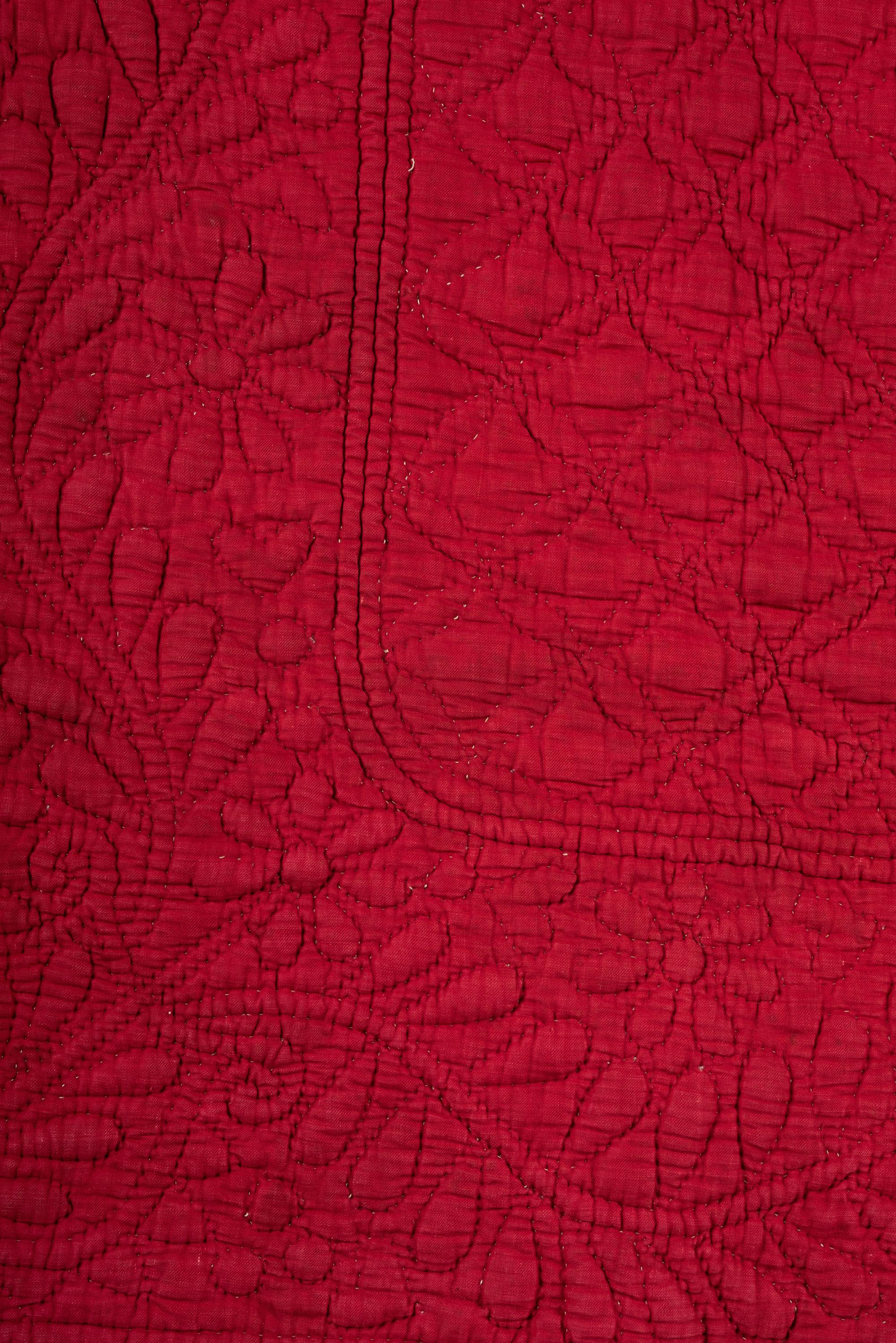 A Trapunto 'Heart' Pattern Cotton Quilt