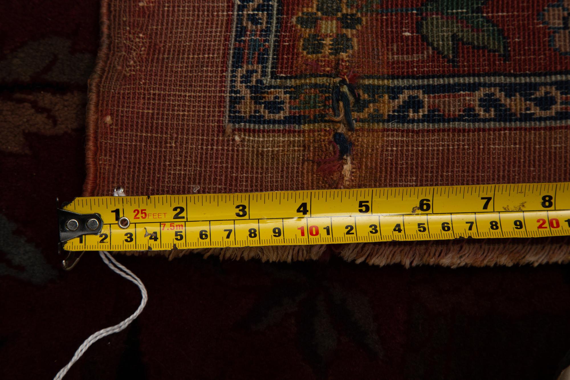 A Kirman Wool Rug