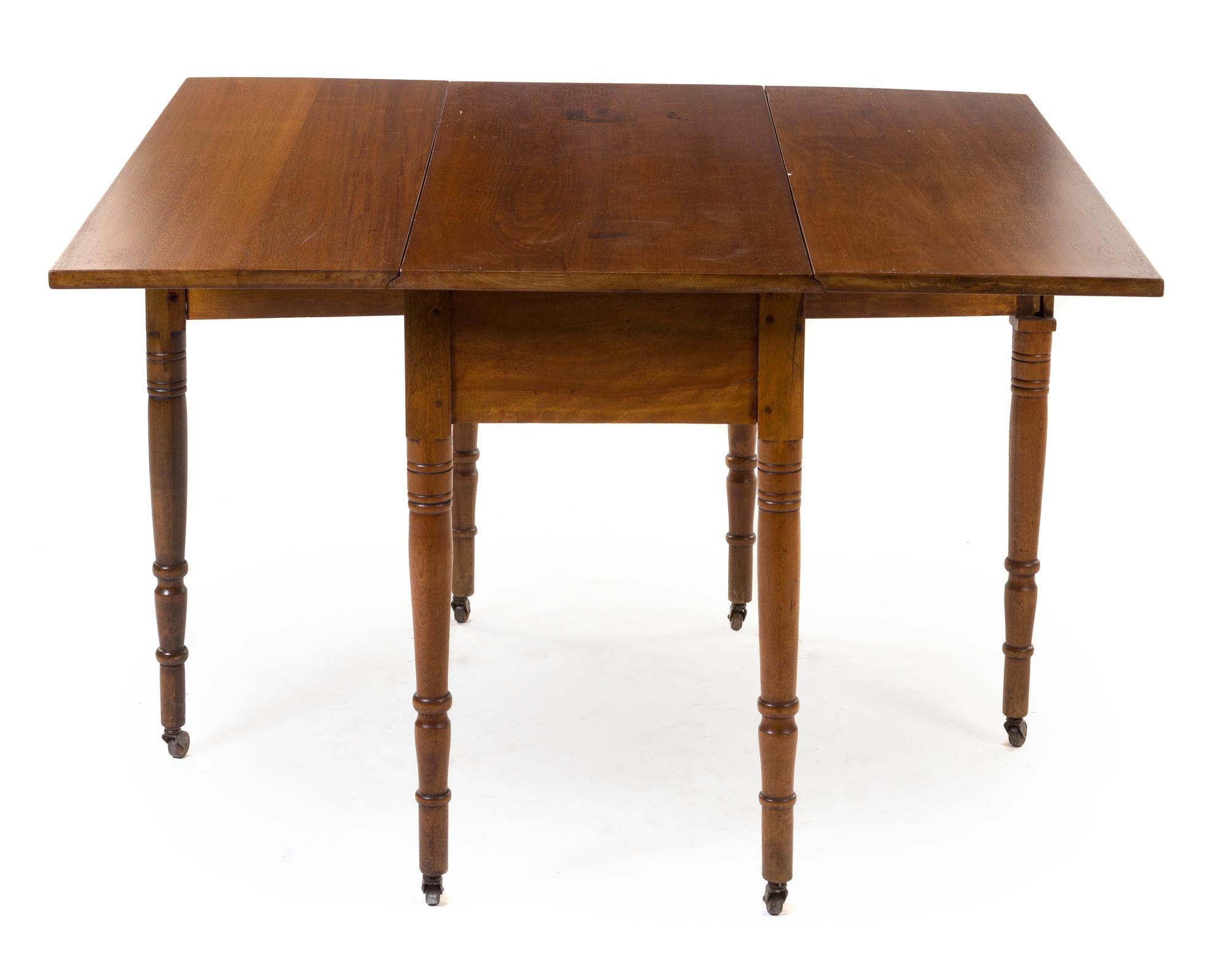 An American Maple Drop Leaf Table Height 28 1/2 x width 44 1/2 x depth 18 inches (closed). — 19TH/20TH CENTURY