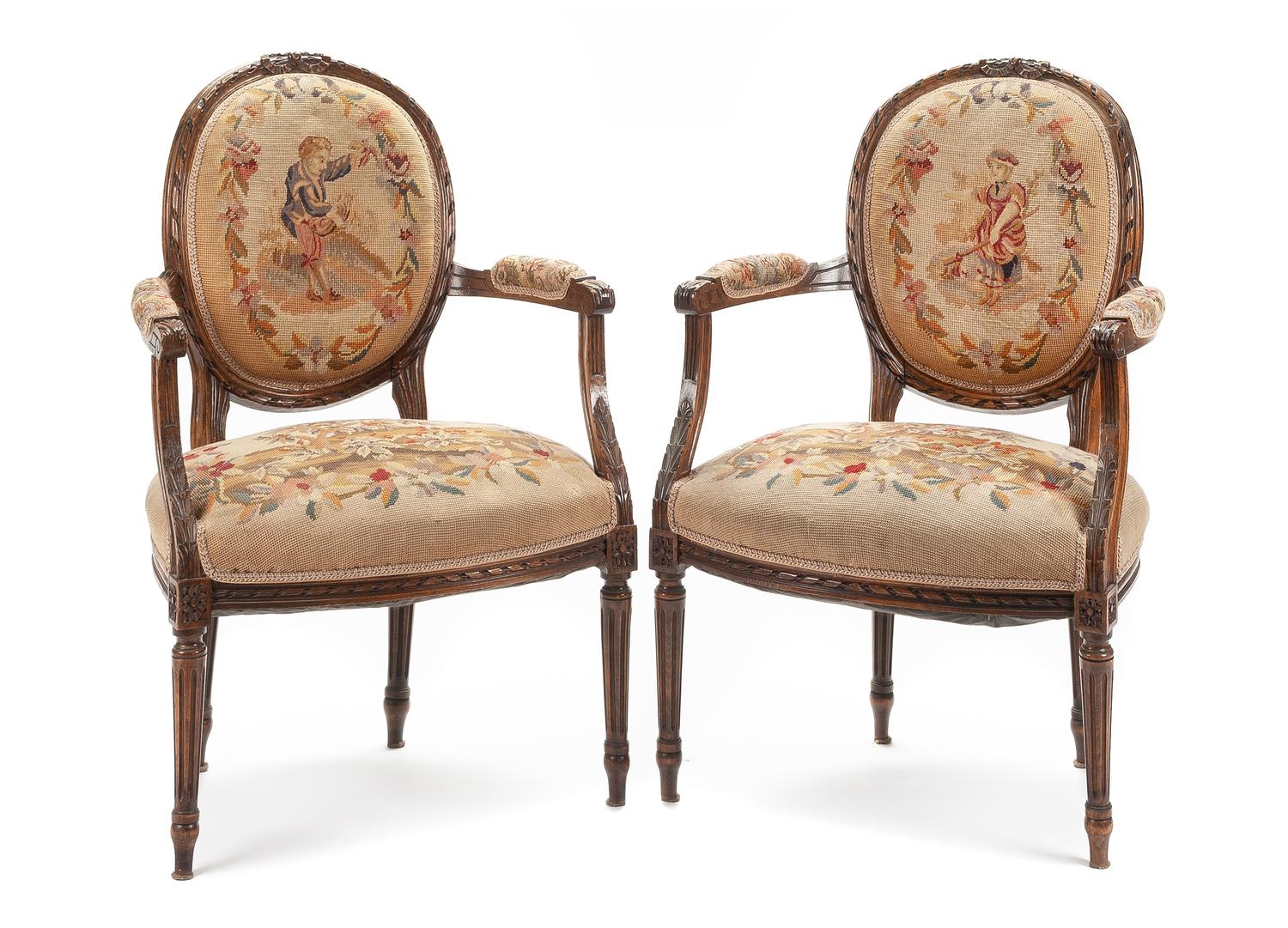 A Pair of Louis XV Style Walnut Fauteuils Height 35 inches. — 19TH CENTURY