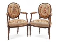 A Pair of Louis XV Style Walnut Fauteuils Height 35 inches. — 19TH CENTURY
