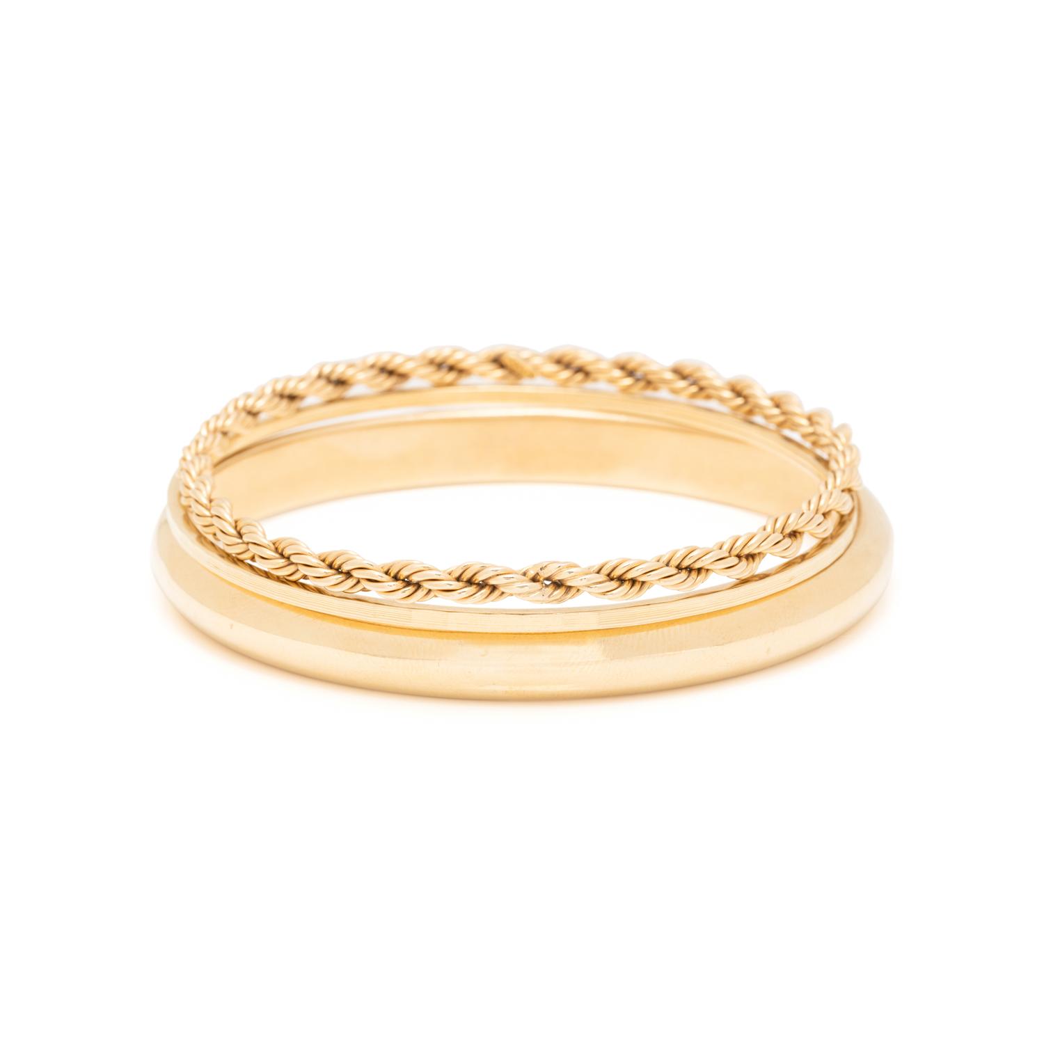 COLLECTION OF YELLOW GOLD BANGLE BRACELETS