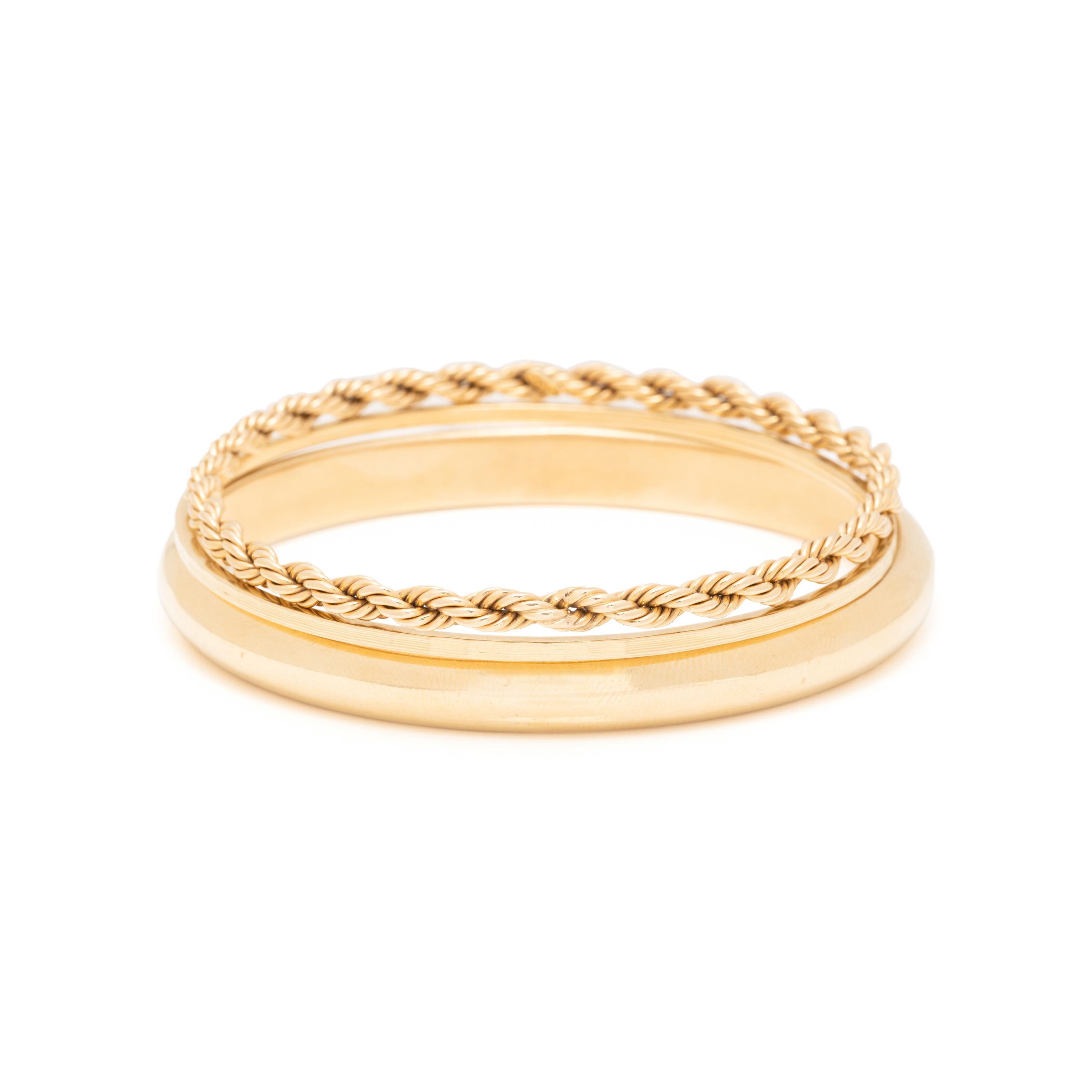 COLLECTION OF YELLOW GOLD BANGLE BRACELETS