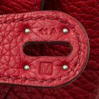 An Hermes Rouge Garance Taurillon Clemence Lindy 30 Handbag, 12" x 7.5" x 6.5".
