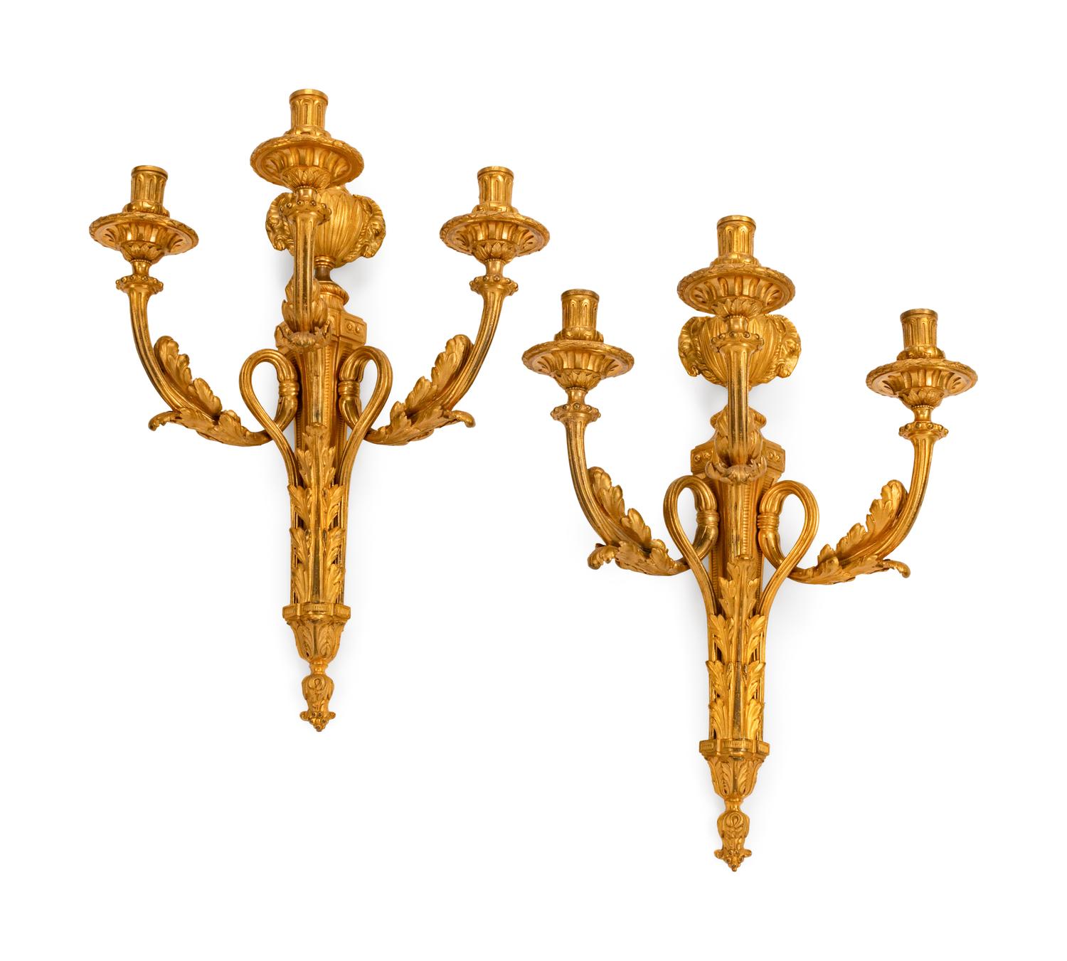 A Pair of Louis XVI Style Gilt-Bronze Three-Light Sconces
