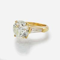 A Ladies Diamond and 18K Yellow Gold Ring 5.85 Carat Round Brilliant Diamond, GIA Certified
