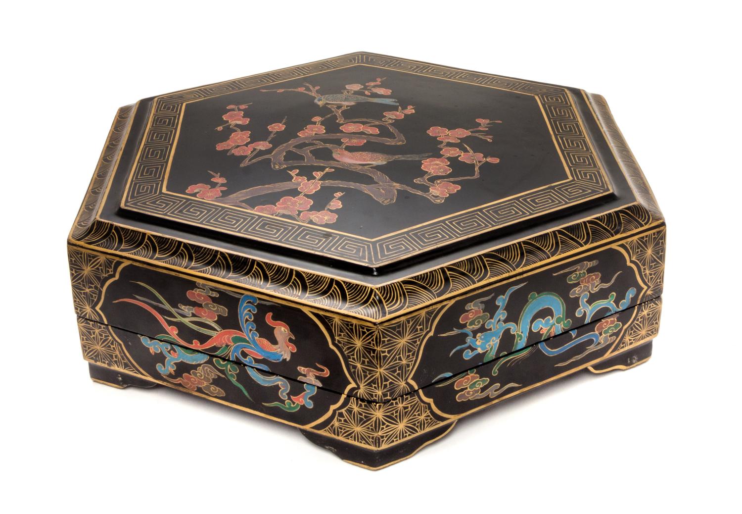 A Black Lacquer Covered Box Diameter 19 3/4 inches.