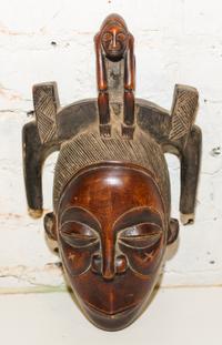 A Guro Wood Mask. Height 14 1/2 inches.
