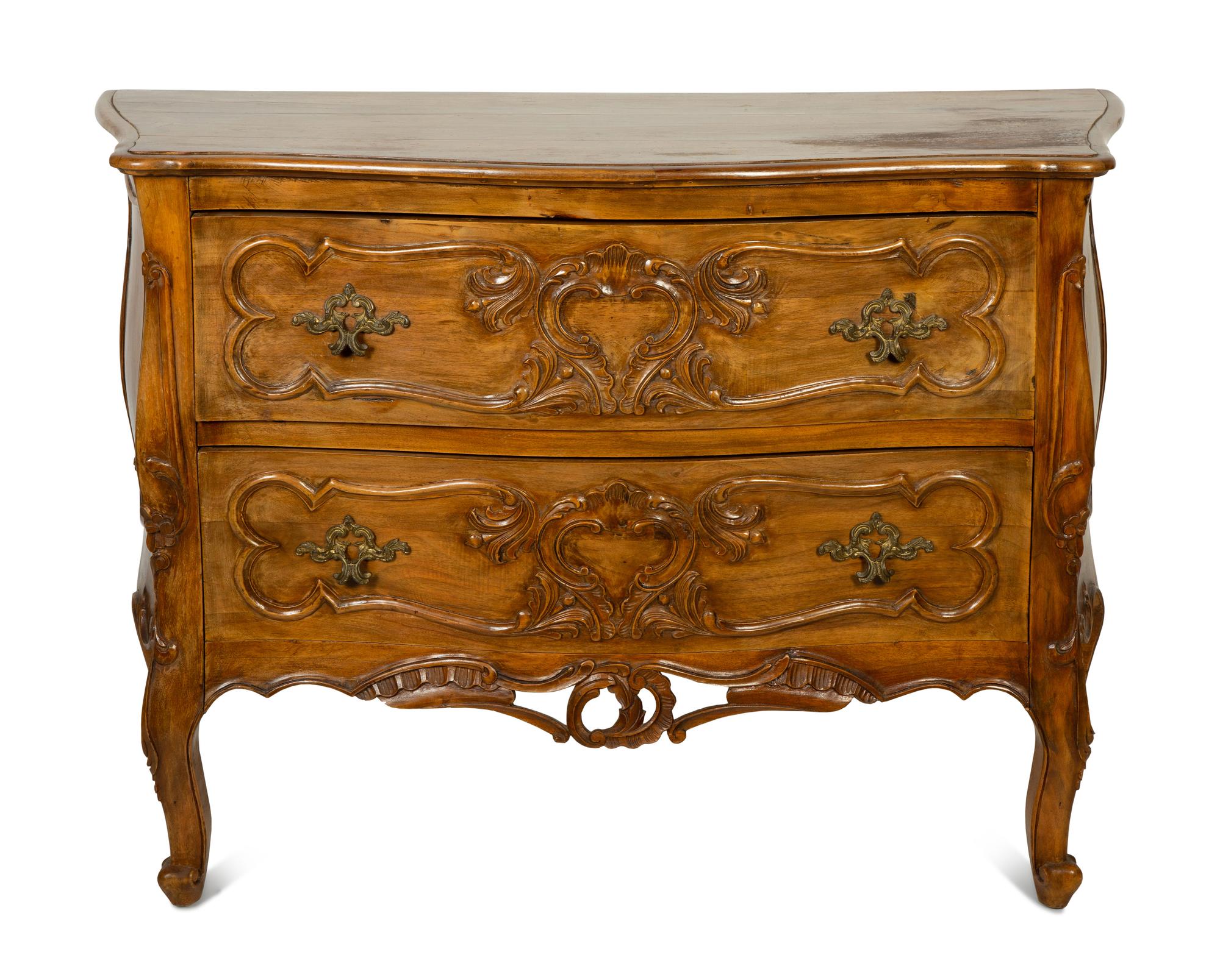 A Louis XV Provincial Style Walnut Commode