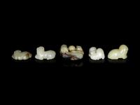 Five Chinese Celadon Jade Carved Recumbent Mythical Beasts