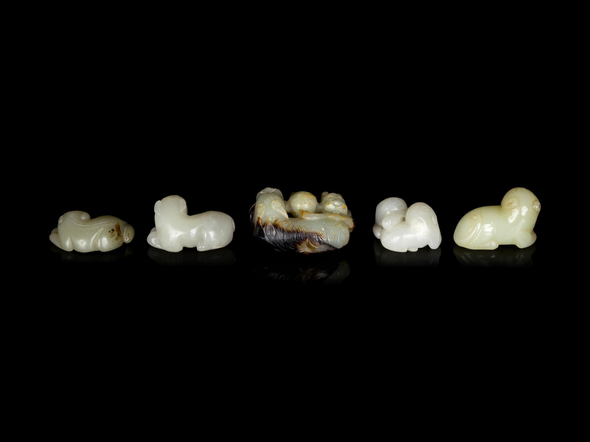 Five Chinese Celadon Jade Carved Recumbent Mythical Beasts