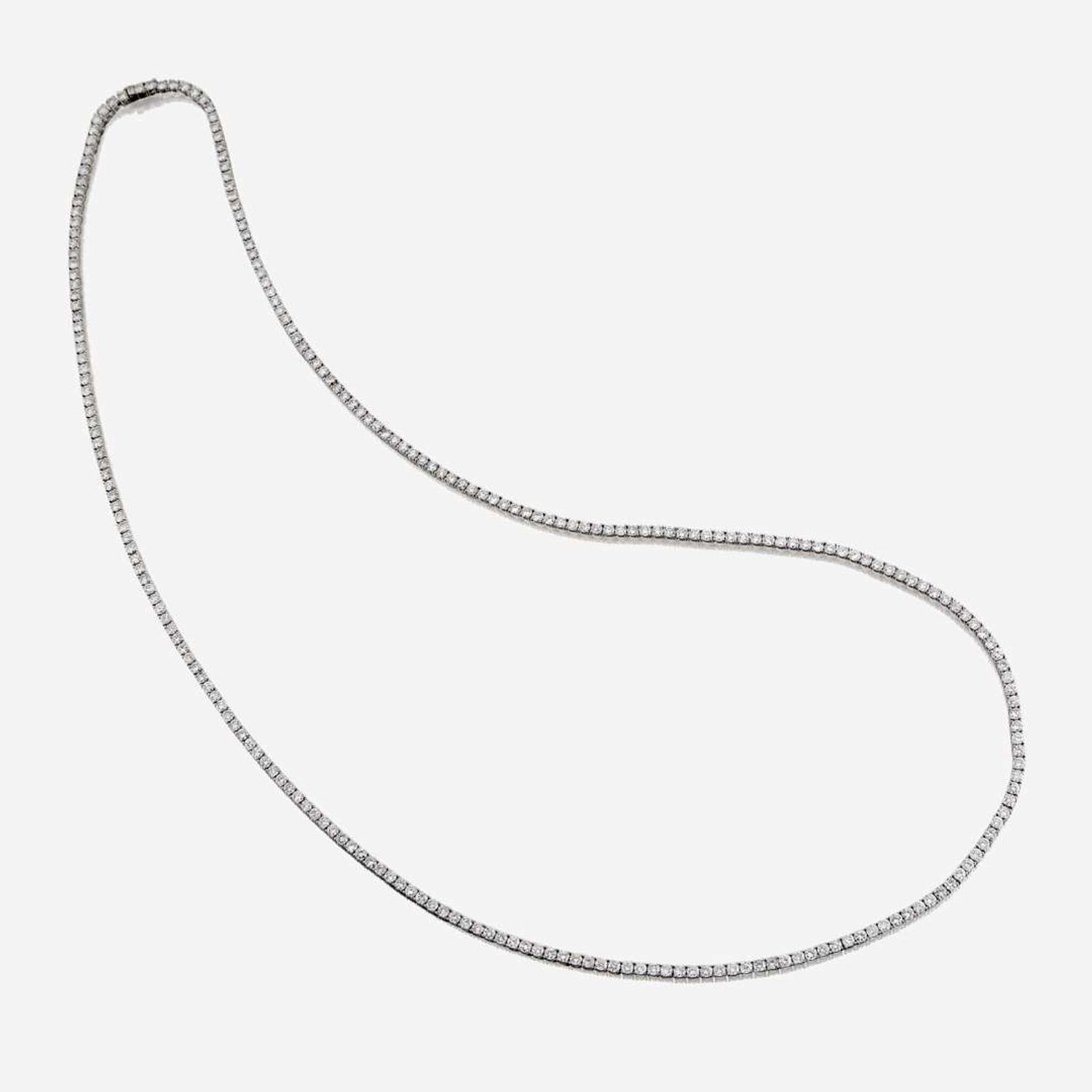 A diamond and eighteen karat white gold necklace