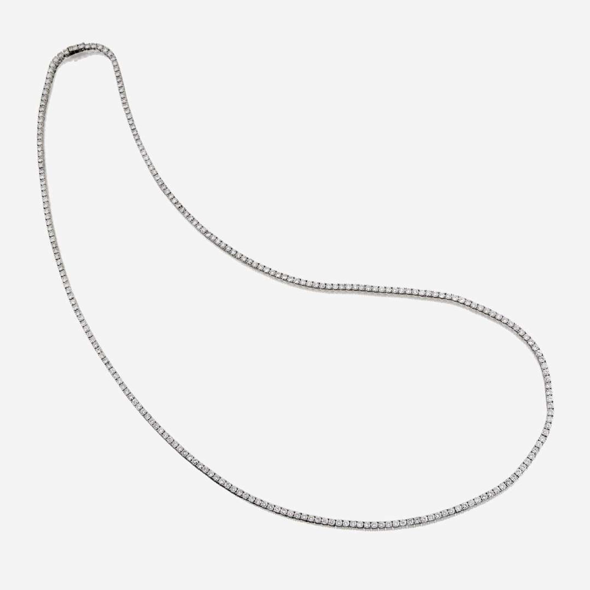 A diamond and eighteen karat white gold necklace