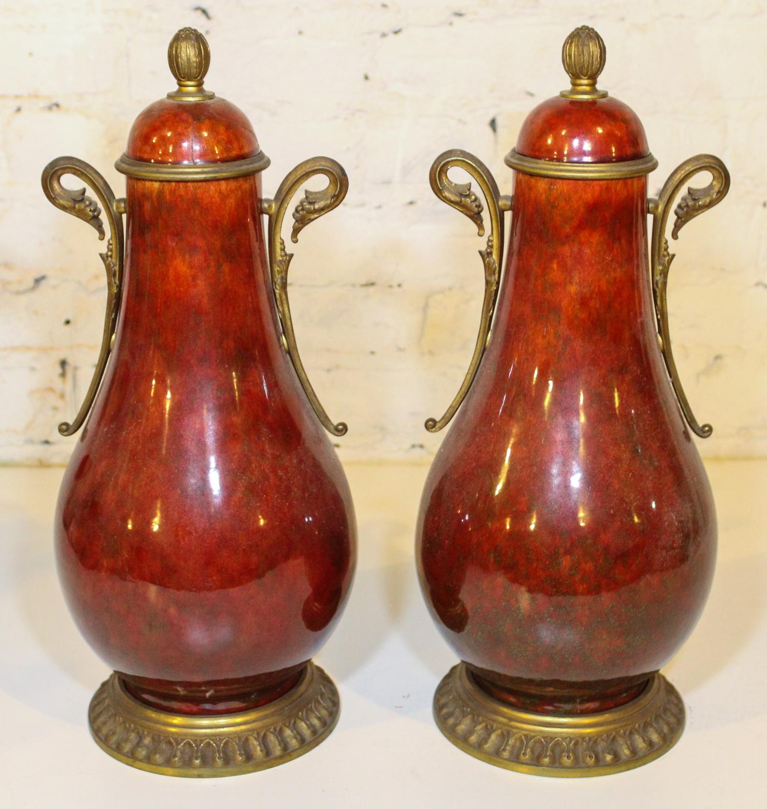A Pair of Sevres Gilt Bronze Mounted Vases. Height 17 1/4 inches.