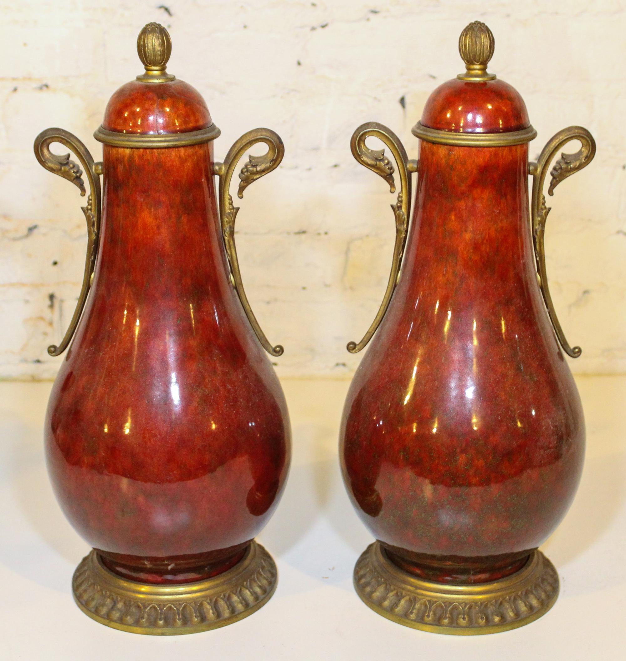 A Pair of Sevres Gilt Bronze Mounted Vases. Height 17 1/4 inches.