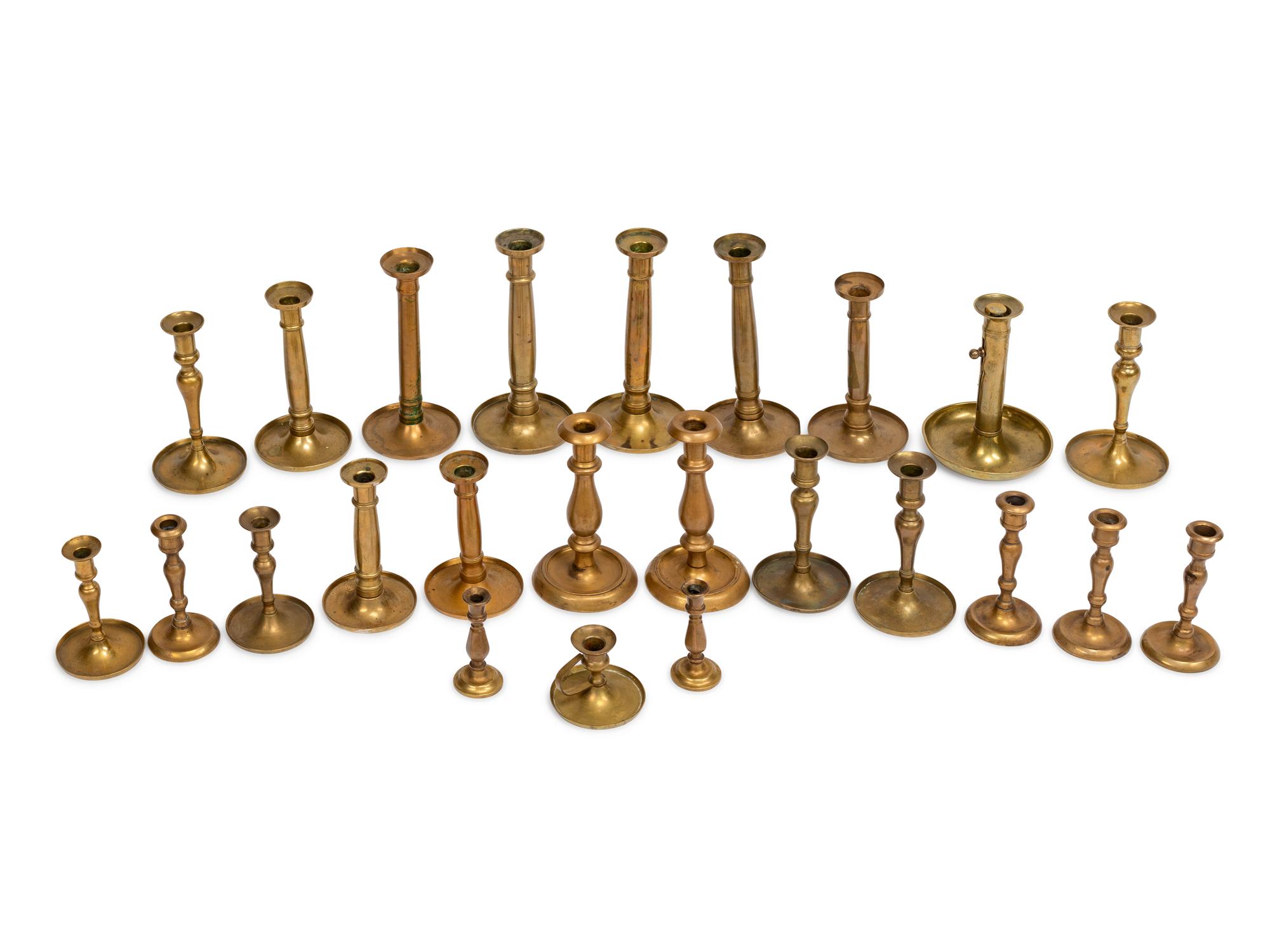 Twenty-Four English Brass Candlesticks