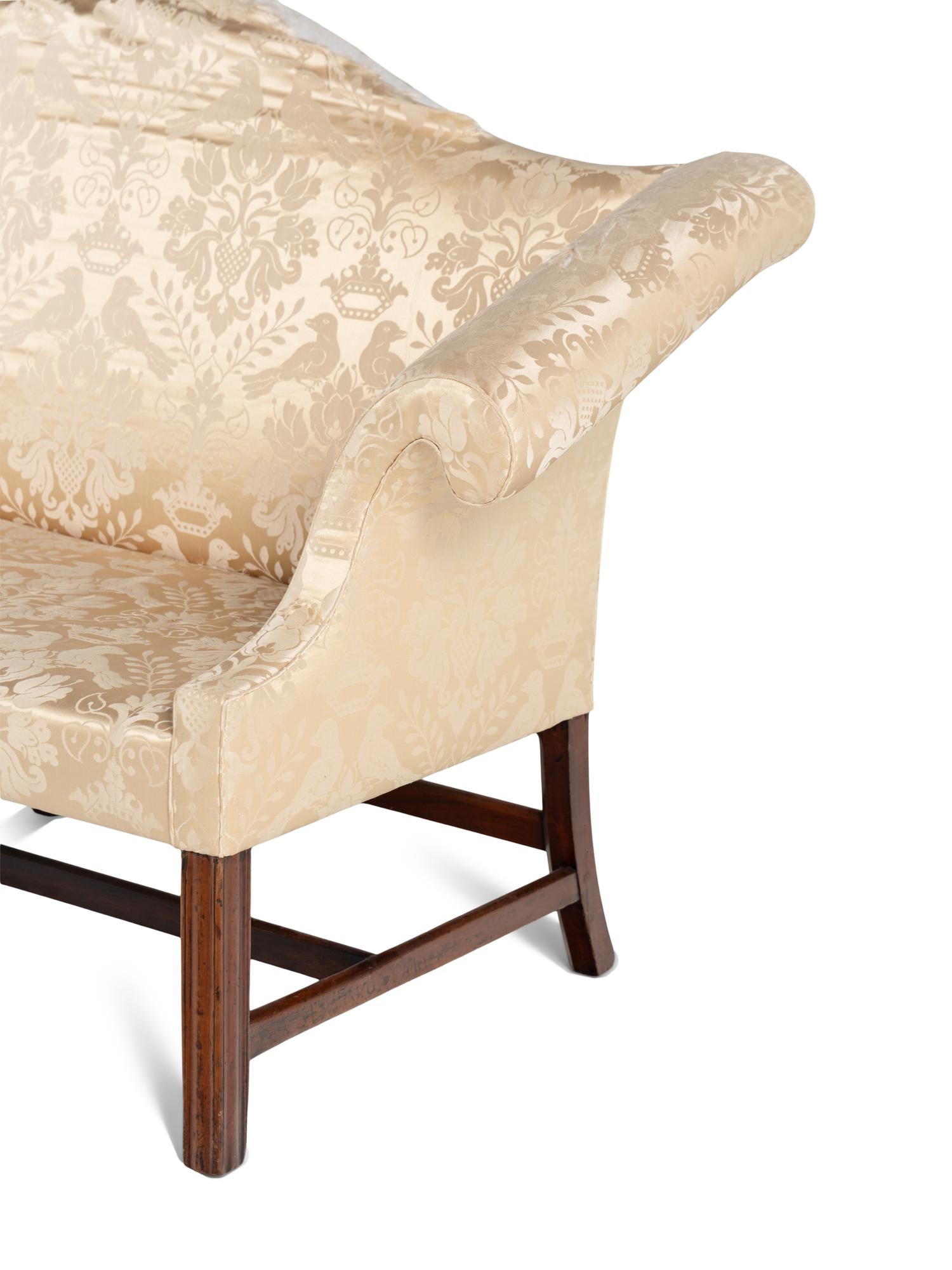 A George III Mahogany Camelback Sofa