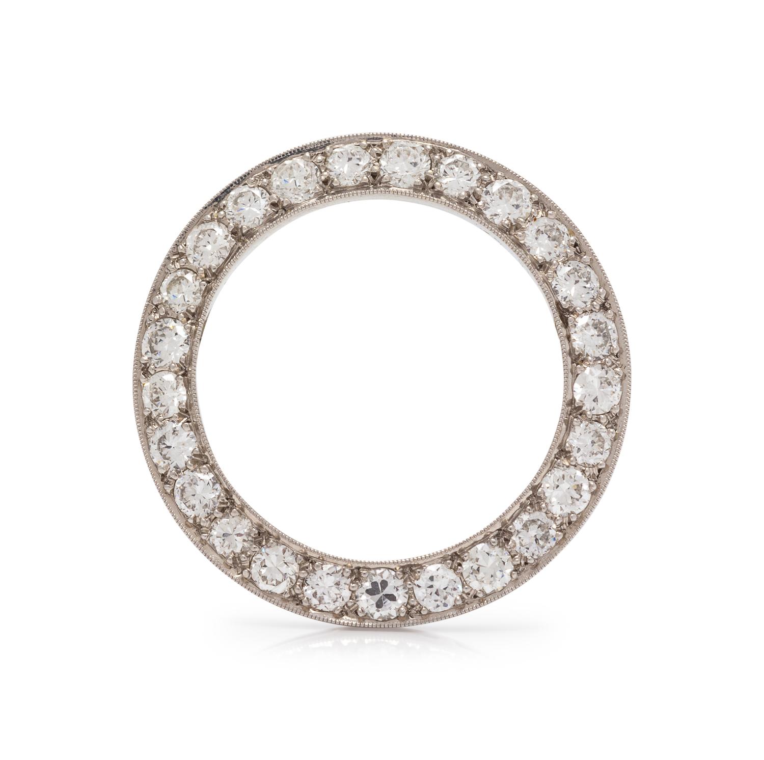 A Platinum and Diamond Circle Brooch, Maurice Tishman,