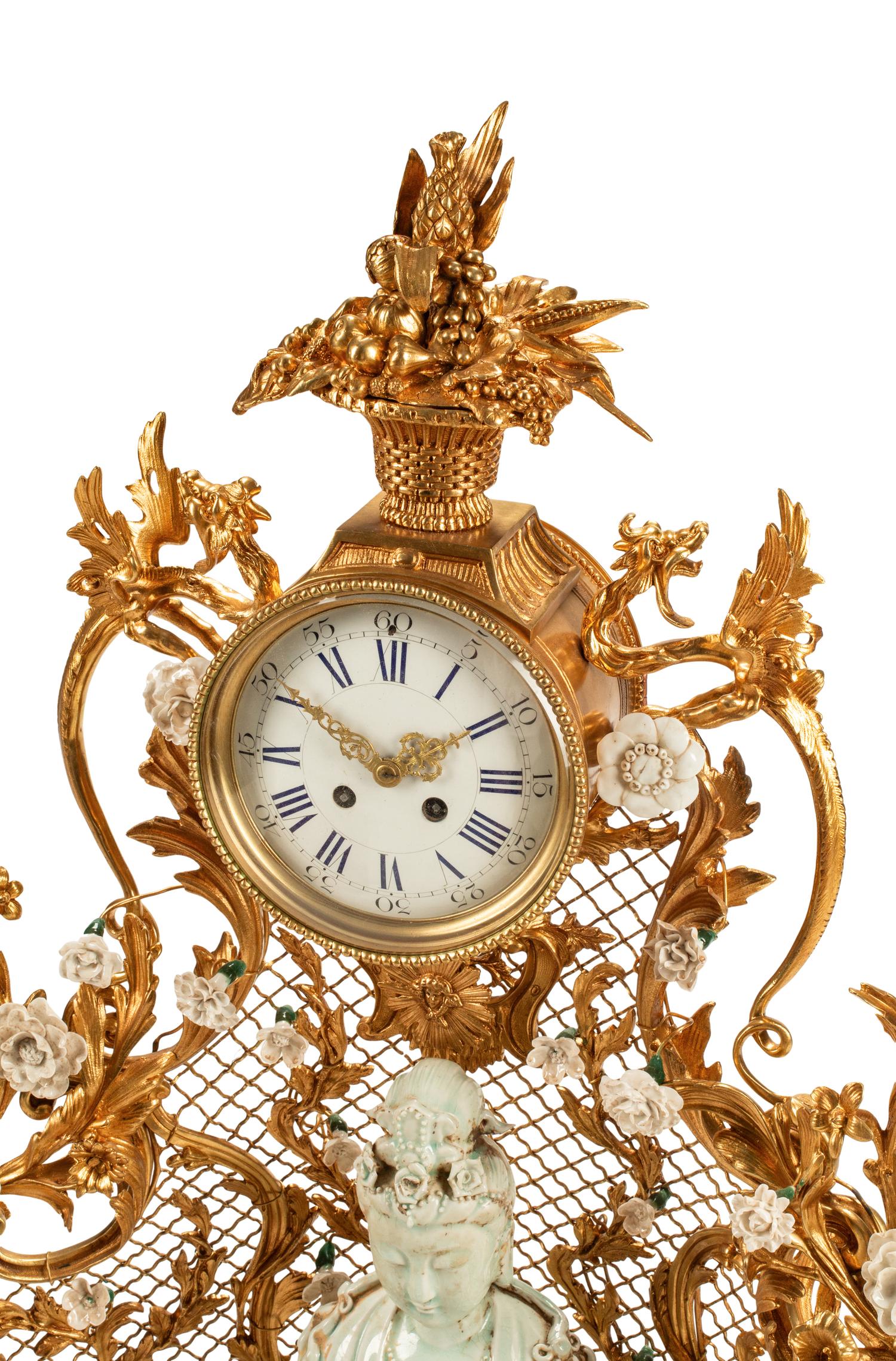 A Large Louis XV Style Gilt Bronze and White Porcelain Clock