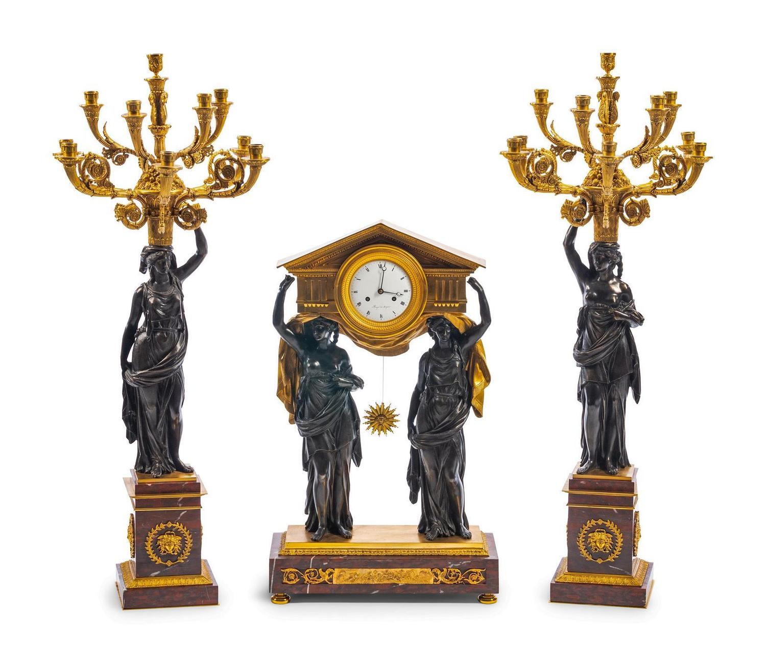 A Large French Gilt and Patinated Bronze and Rouge Marble Three-Piece Clock Garniture