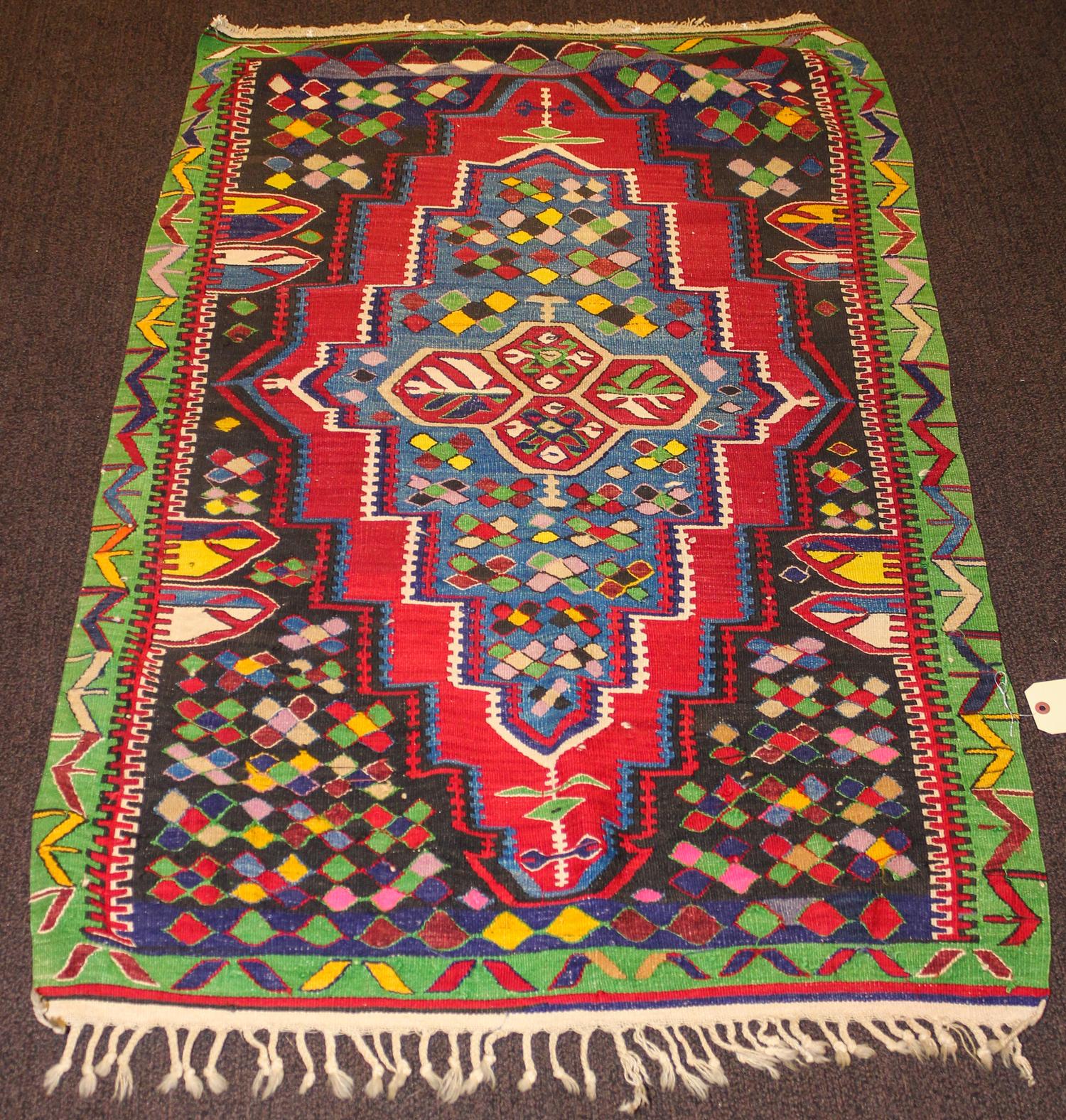 A Kilim Flatweave Wool Rug 4 feet 9 inches x 3 feet 1/2 inch. — 20TH CENTURY