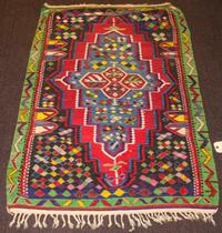 A Kilim Flatweave Wool Rug 4 feet 9 inches x 3 feet 1/2 inch. — 20TH CENTURY