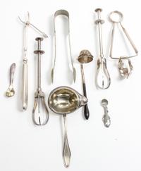 A Collection of Nine Silver and Silver-Plate Serving Articles, various makers, comprising two silver sauce ladles, two silver salt spoo