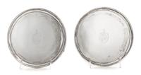 A Pair of George III Silver Salvers, John Edwards III, London, 1790, each centered by an engraved armorial shield surmounted by dragon