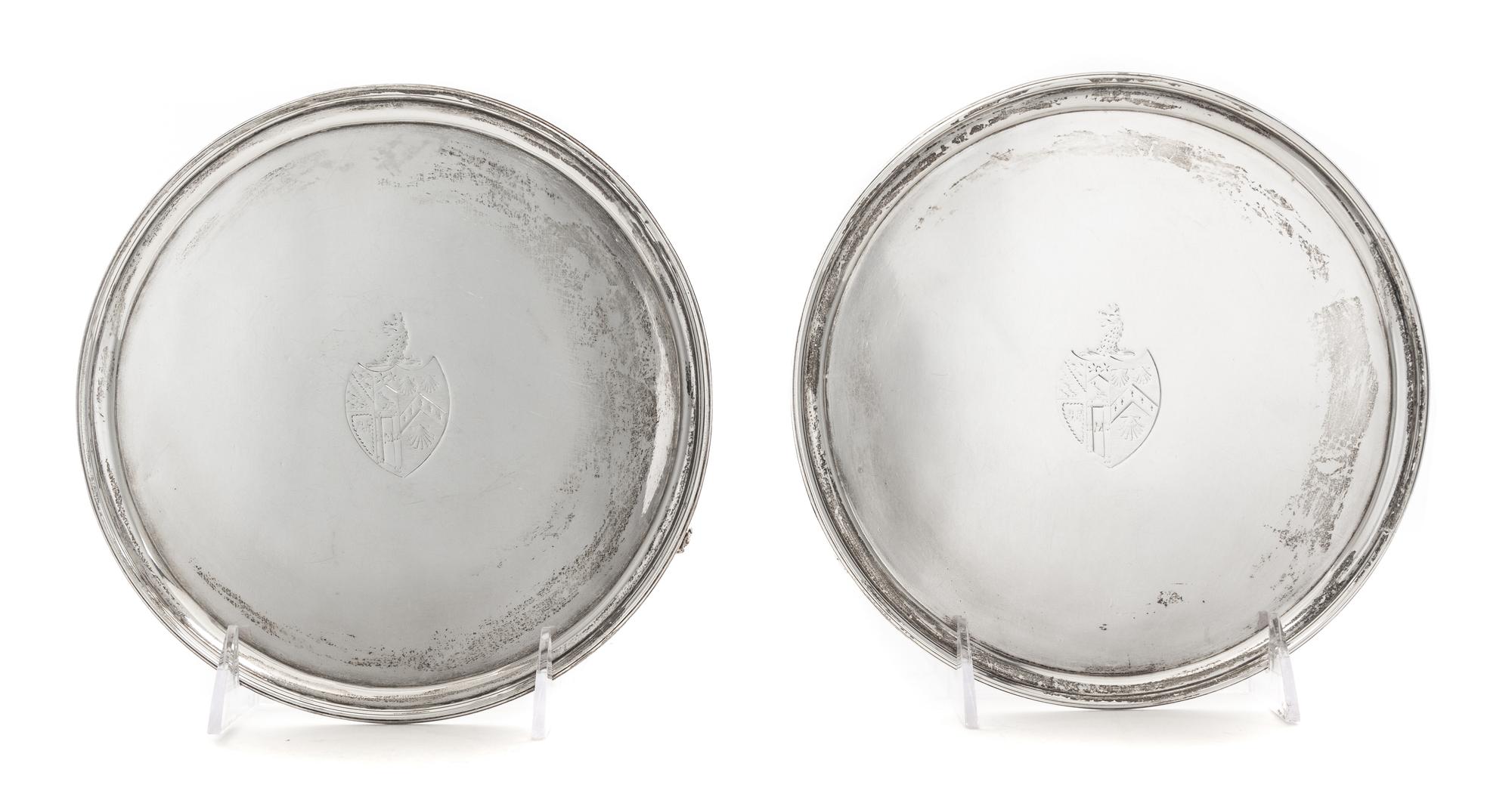 A Pair of George III Silver Salvers, John Edwards III, London, 1790, each centered by an engraved armorial shield surmounted by dragon