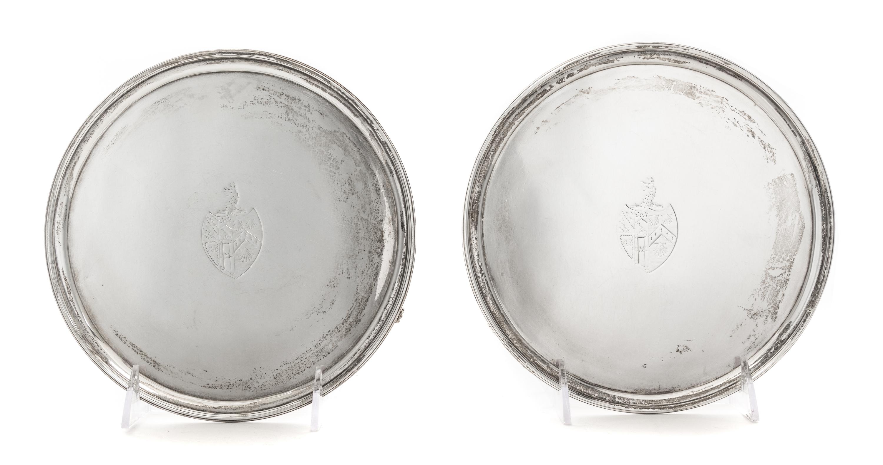 A Pair of George III Silver Salvers, John Edwards III, London, 1790, each centered by an engraved armorial shield surmounted by dragon