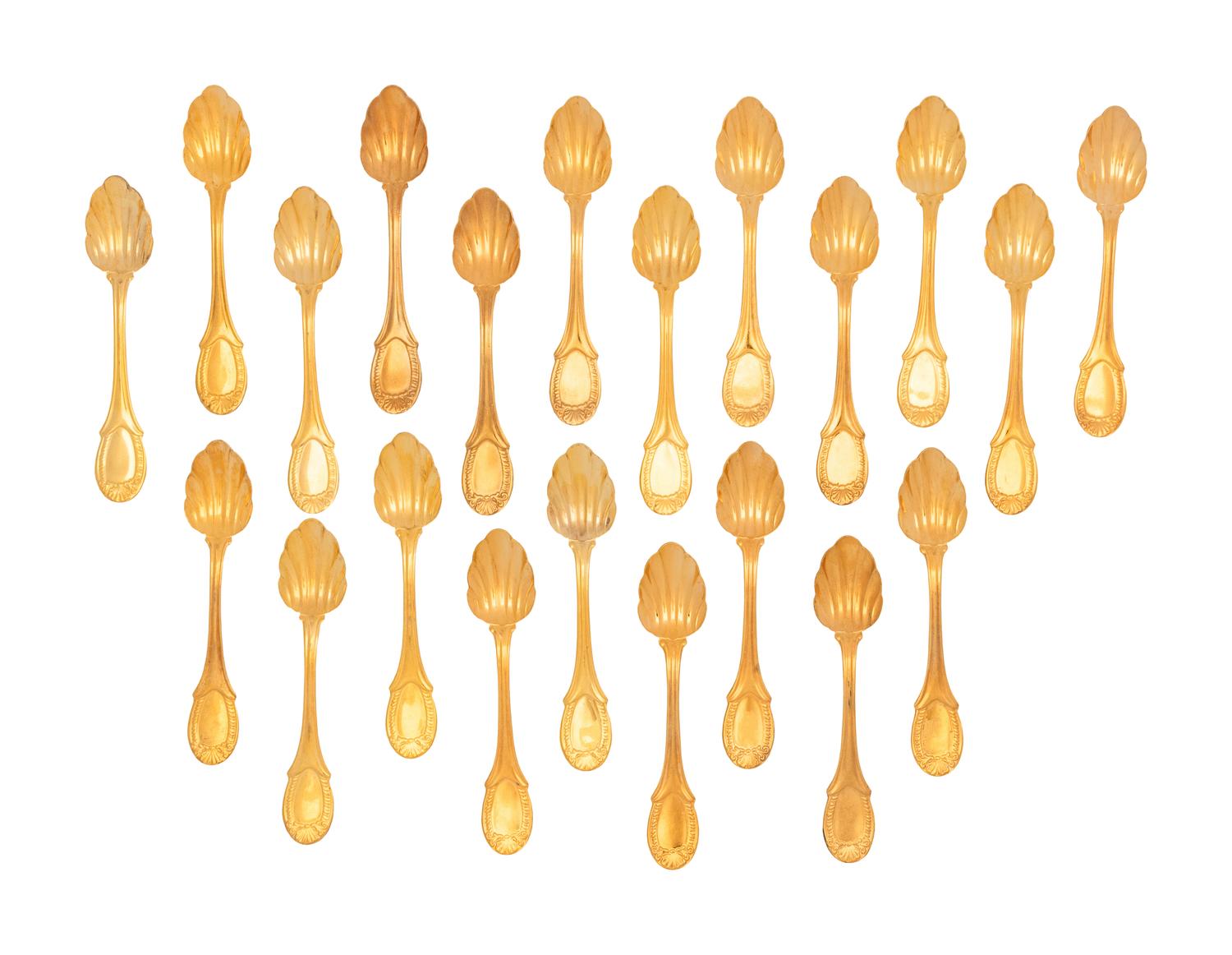A Set of Twenty-One Gilt Metal Dessert Spoons