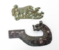 An Archaistic Patinated Metal Blade and a Buckle Fitting Width of first 8 inches. — 20TH CENTURY