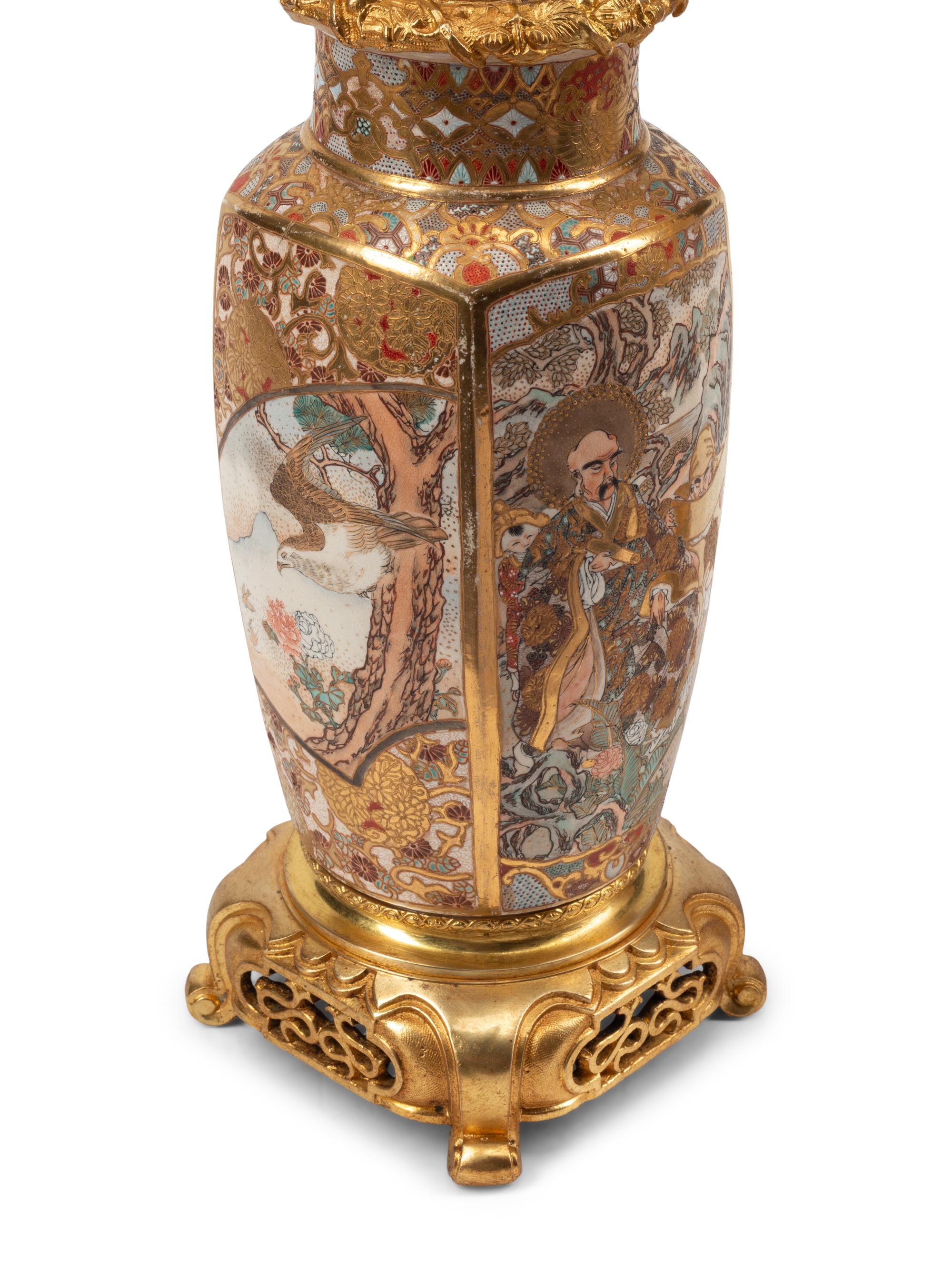 A Pair of Gilt Bronze and Japanese Satsuma Porcelain Candelabra
