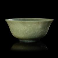 A Chinese Celadon Jade 'Dragon' Bowl, 20th Century 近代 青玉刻龍紋碗