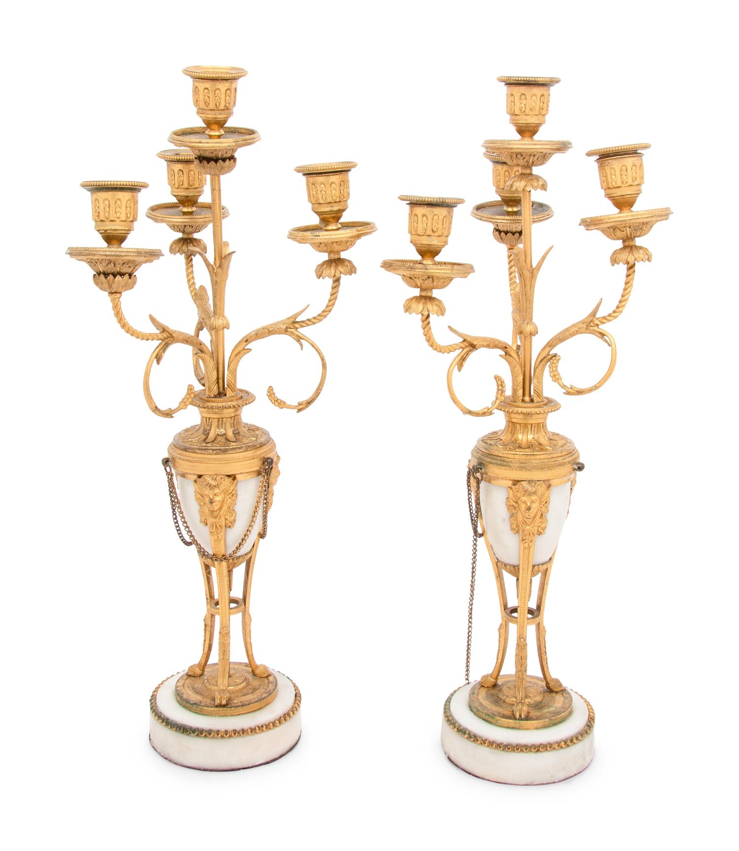 A Pair of French Gilt Bronze and Marble Four-Light Candelabra