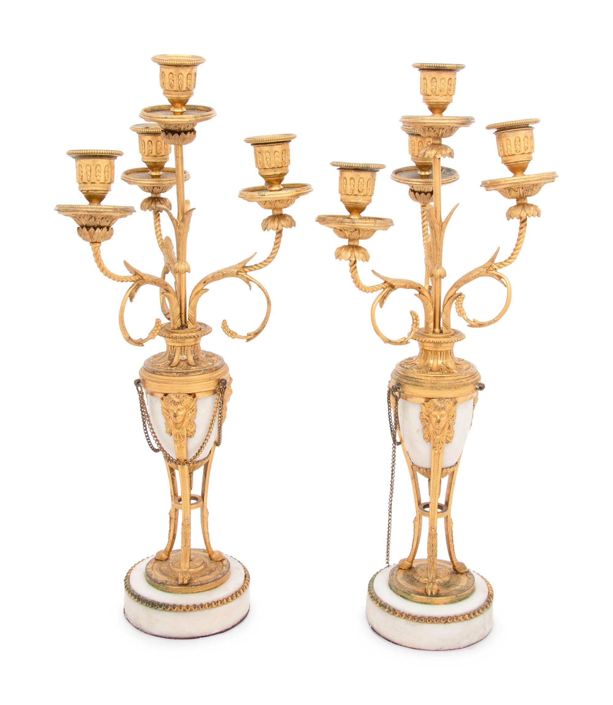 A Pair of French Gilt Bronze and Marble Four-Light Candelabra